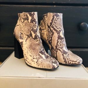 Shelly’s London heeled snakeskin booties